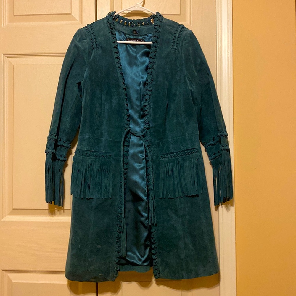 Pamela McCoy emerald Green Leather jacket. 3/4 length. Fringed sleeves/pockets.